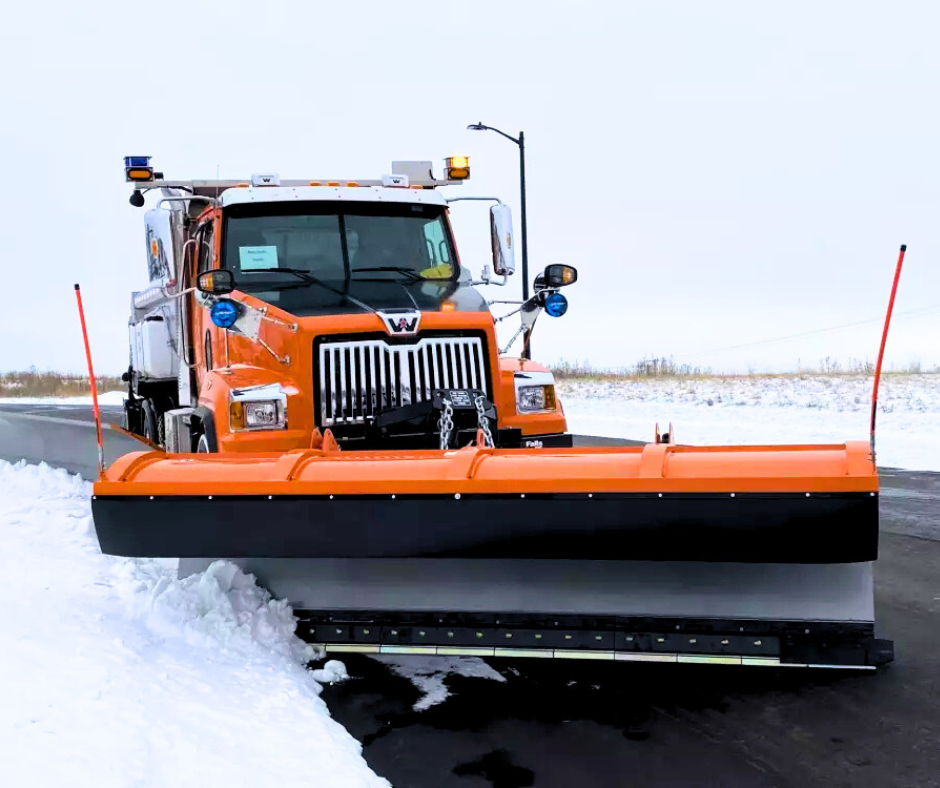 A Western Star 4700SF Plowing Snow